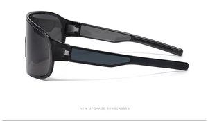 Detail view of the black sports cycling sunglasses with durable wide temples and matte frame