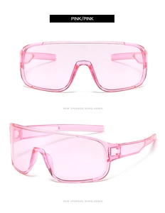 Close-up of pink oversized sports sunglasses with a seamless one-piece lens design