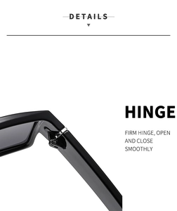 Detailed view of the sturdy metal hinge construction on black polarized sunglasses