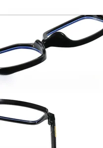 Detail of lightweight integrated nose pads and reinforced metal hinges on black glasses
