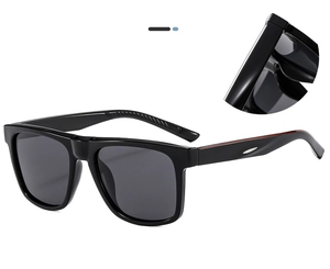 Détail des lunettes de soleil de sport polarisées avec charnière argentée et accent rouge
