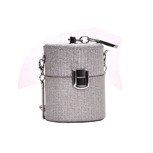 Silver sequin cylinder evening clutch bag with metal ring handle and chain strap