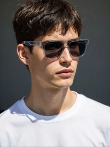 Close-up of men's square polarized sunglasses with a clear frame on a male model