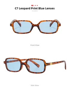 Detail view of retro square leopard frames with blue lenses and gold metal accents