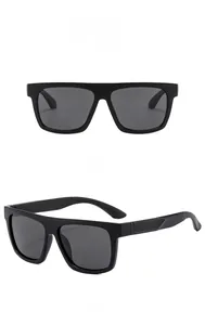 Detailed views of matte black polarized sunglasses featuring wide square frames and gray lenses