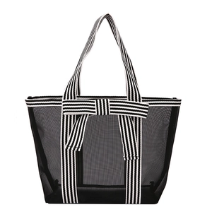 Minimalist black mesh tote bag with striped straps and decorative bow for women