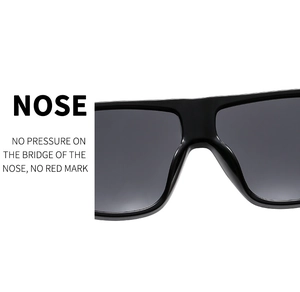 Detail of integrated nose pads on black oversized sunglasses for pressure-free comfort