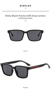 Detail view of square black sunglasses with gray lenses and red stripe accents