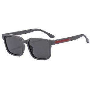 Polarized rectangular gray sunglasses with stylish red temple accents on white background