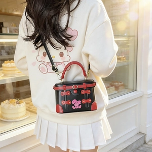 Japanese style box bag in black and red with pink bunny design and dual buckles