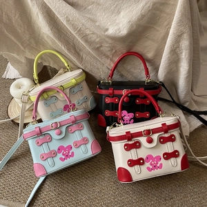 Mini crossbody box bags with rabbit print and metal buckles in four vibrant colorways