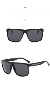 Detail view of large square shiny black frames with gray polarized driving lenses