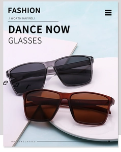 Detailed close-up of polarized sport sunglasses on a white plate with light blue background