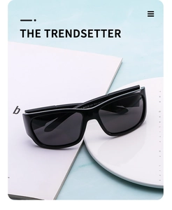 Close-up of polarized rectangular sunglasses showing frame specifications and interior details