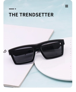Detail view of polarized rectangular sunglasses showing CE certification on temple arm