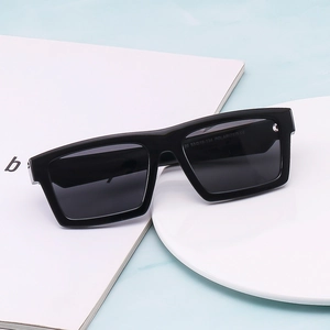 Rectangular polarized sports sunglasses for men featuring a black frame and grey lenses