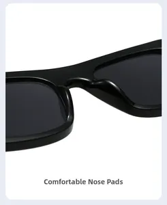 Detail of ergonomic nose pads on glossy black oversized square sunglasses frames