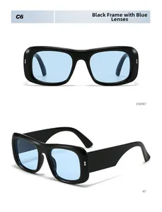 Detail view of black frame sunglasses with blue lenses and metal temple accents