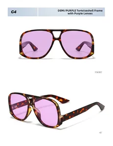 Detail view of tortoiseshell aviator sunglasses with stylish translucent purple lenses