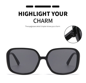 Detailed macro view of durable metal hinge structure on square black oversized sunglasses