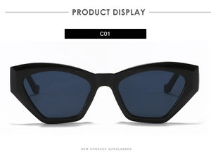 Close-up of C01 black geometric cat-eye sunglasses with thick frames and dark lenses