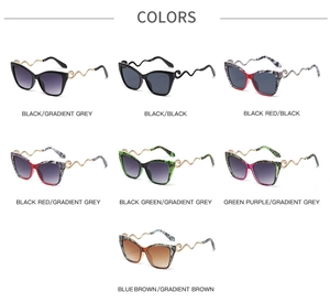 Selection of cat eye sunglasses with gold snake-shaped metal temples in various colors