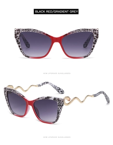 Close-up of golden snake-shaped metal temples on cat eye sunglasses with leopard pattern
