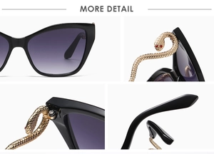 Detail of gold snake-shaped metal temples on cat eye sunglasses with purple gradient lenses