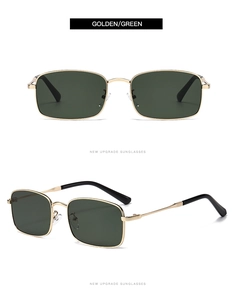 Close-up of rectangle sunglasses with golden metal frame and dark green lenses
