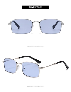Detail view of silver rectangular metal sunglasses with light blue lenses and black tips