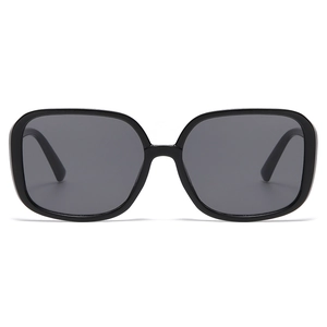 Retro oversized square sunglasses with black frames and dark lenses for men and women
