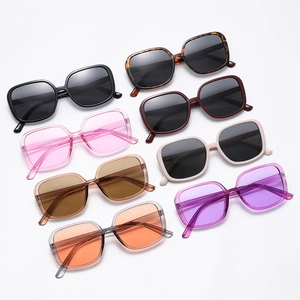Retro oversized square sunglasses in multiple colors like black, tortoise, and orange