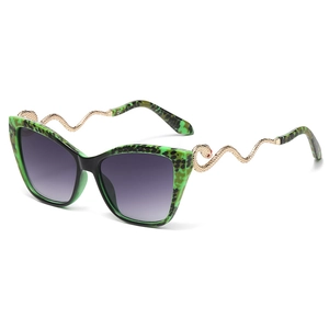 Vintage cat-eye sunglasses with green tortoiseshell frames and snake-shaped metal temples