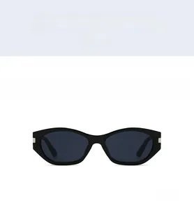 Front view of black polygon cat-eye sunglasses with dark lenses and metallic hinge detail