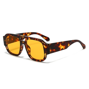 Retro oversized tortoiseshell sunglasses with yellow lenses and thick square frames