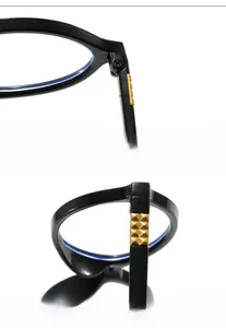 Detail of the reinforced gold metal hinge and textured 3D pyramid rivets on black eyeglass frame