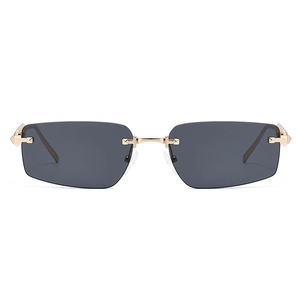 Frameless polygonal sunglasses with gold metal temples and grey translucent lenses