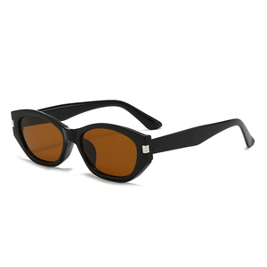 Retro cat-eye sunglasses with thick black frames and brown lenses for women