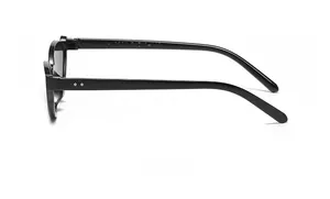 Side view of vintage black sunglasses frame with silver dots and printed temple specs