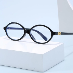 Chic black oval anti-blue light glasses for women with elegant gold metal hinge detail