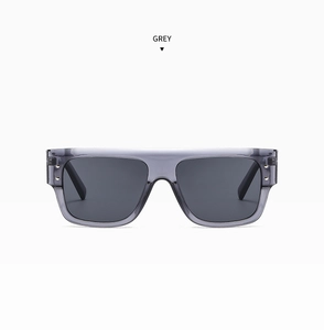 Flat top grey transparent sunglasses with metallic rivets and dark polarized lenses