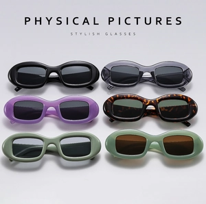 Vue à plat de lunettes de soleil ovales rétro en six couleurs, dont écaille et pastel