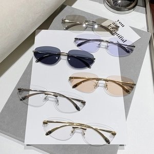 Lunettes de soleil Y2K ovales sans monture avec verres de différentes couleurs