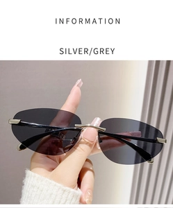 Détail des lunettes de soleil ovales sans monture Y2K avec cadre argenté et verres gris