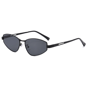 Modern oversized metal cat-eye sunglasses with geometric lenses and hollowed-out temples