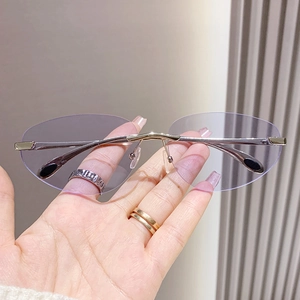 Lunettes de soleil ovales sans monture Y2K avec verres lilas et monture en métal