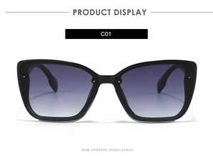Front view of black square frame sunglasses with purple gradient lenses and silver studs