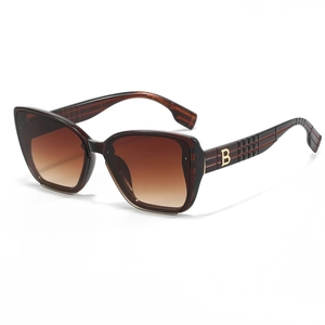Oversized square B-letter sunglasses with gradient brown lenses and wide frames
