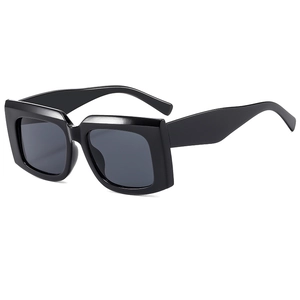 Retro oversized rectangular sunglasses with glossy black frame and dark grey lenses