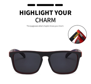 Detail showing the red interior lining and polarized logo on black sports sunglasses